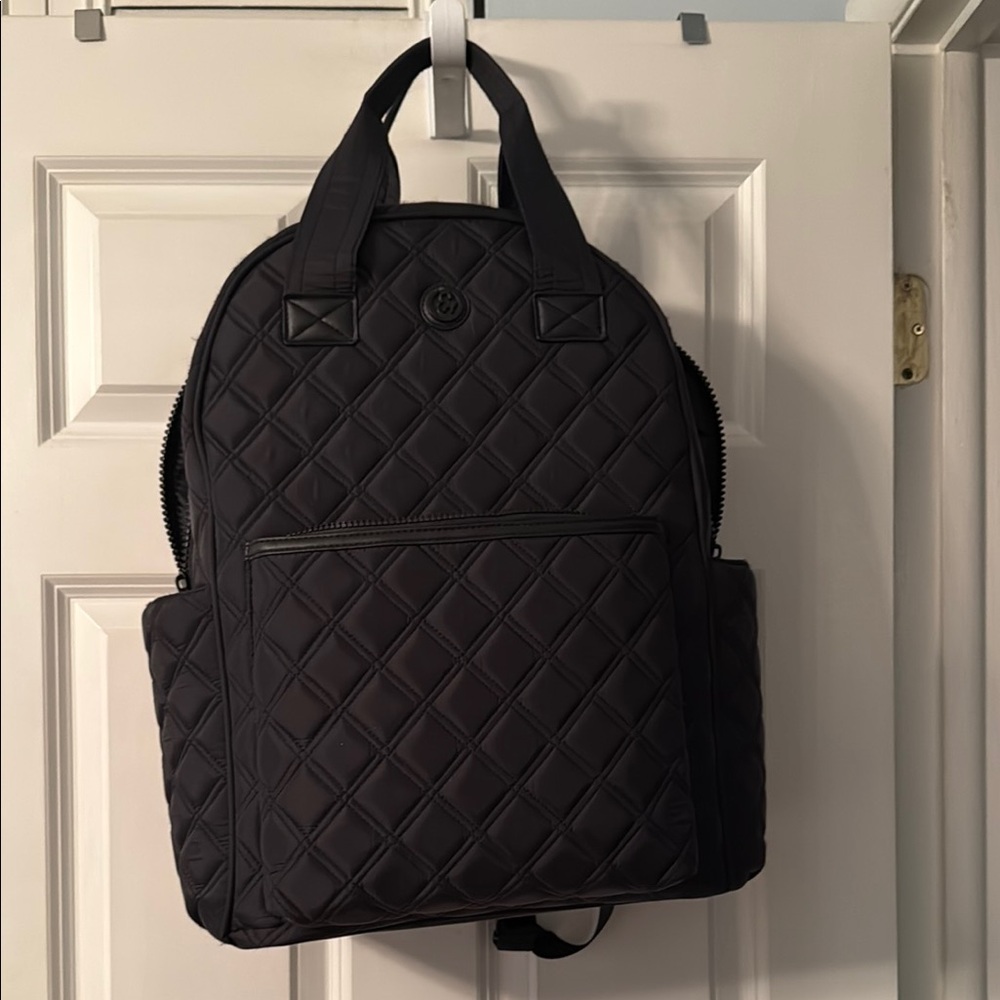 Joan & David Black Quilted Backpack with Dome Top